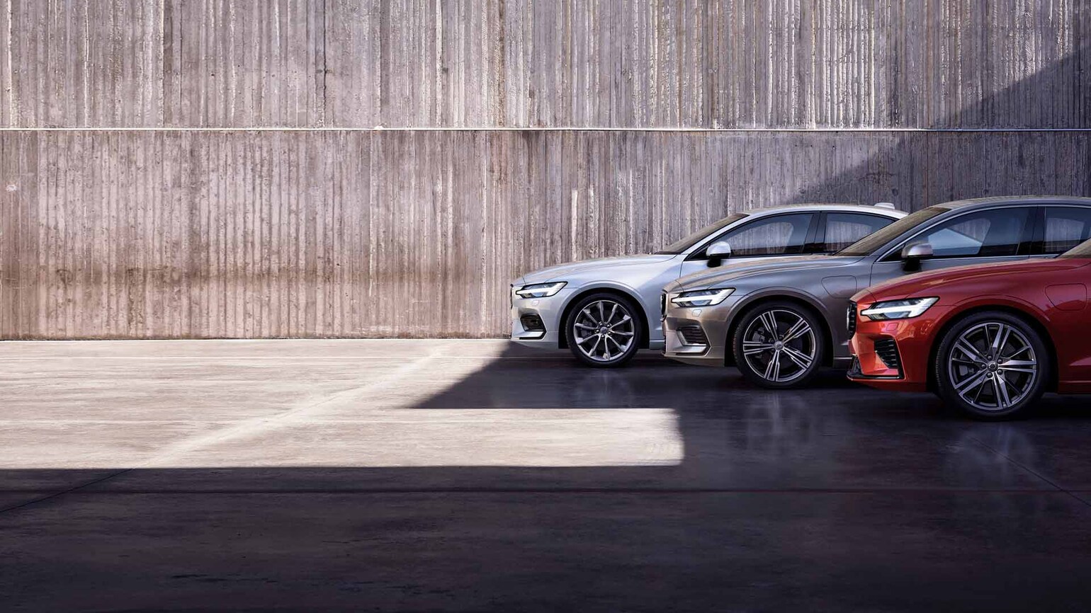 Bilde av ulike Volvo-modeller ute