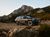 Bilde av BMW iX3 i fjellet